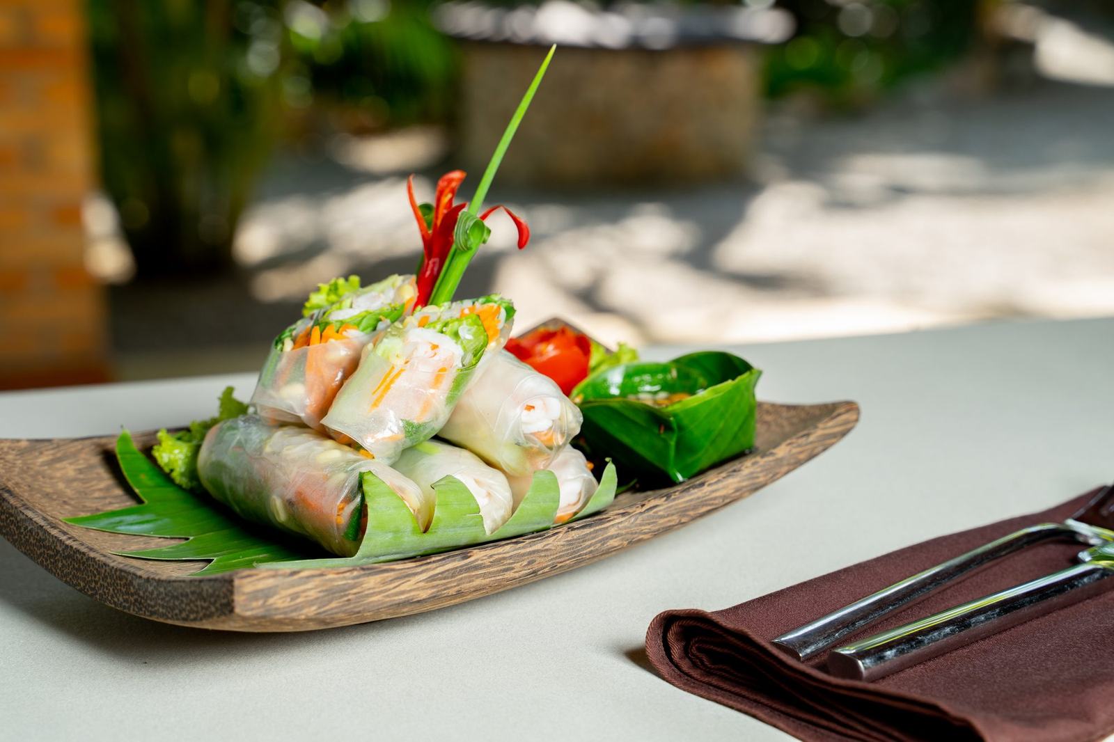 Fresh spring rolls on a banana leaf